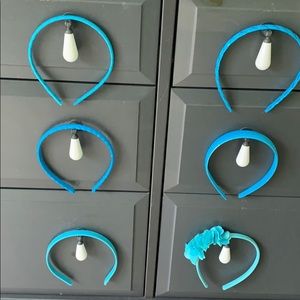 Six blue headbands